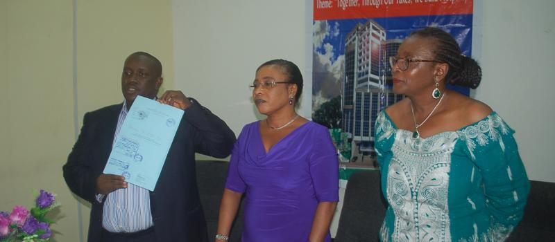 Board Chairman, Sulaiman Kabba-Koroma, Esq  & Commissioner-General at a ceremony establishing the Ebola Health Workers Victim Family Trust Fund